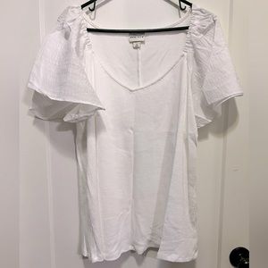 White top with flowy sleeves